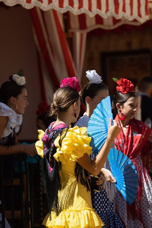 Calor y multitudes este lunes en el real de la Feria
