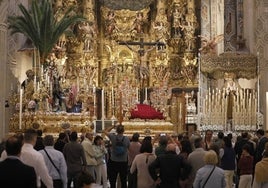 En imágenes, ambiente pleno cofrade en la víspera del Domingo de Ramos de la Semana Santa de Sevilla 2024