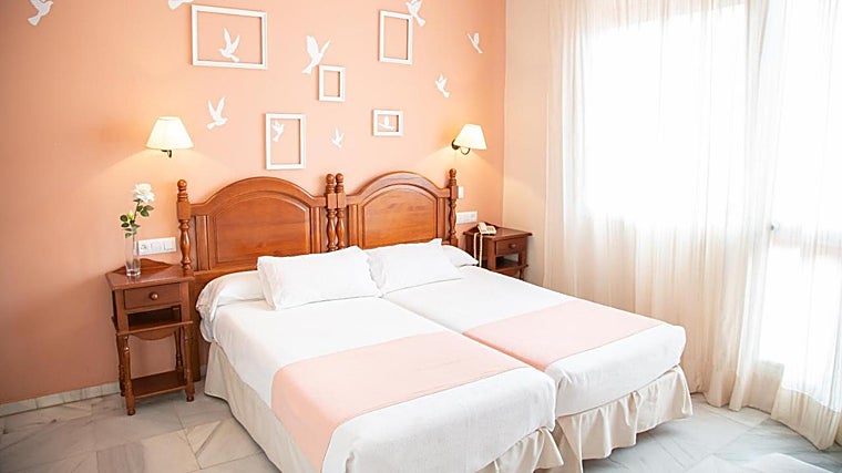 Habitación del hotel Casa Palacio Don Pedro, que presenta el precio más bajo para la noche del «pescaíto» en Sevilla