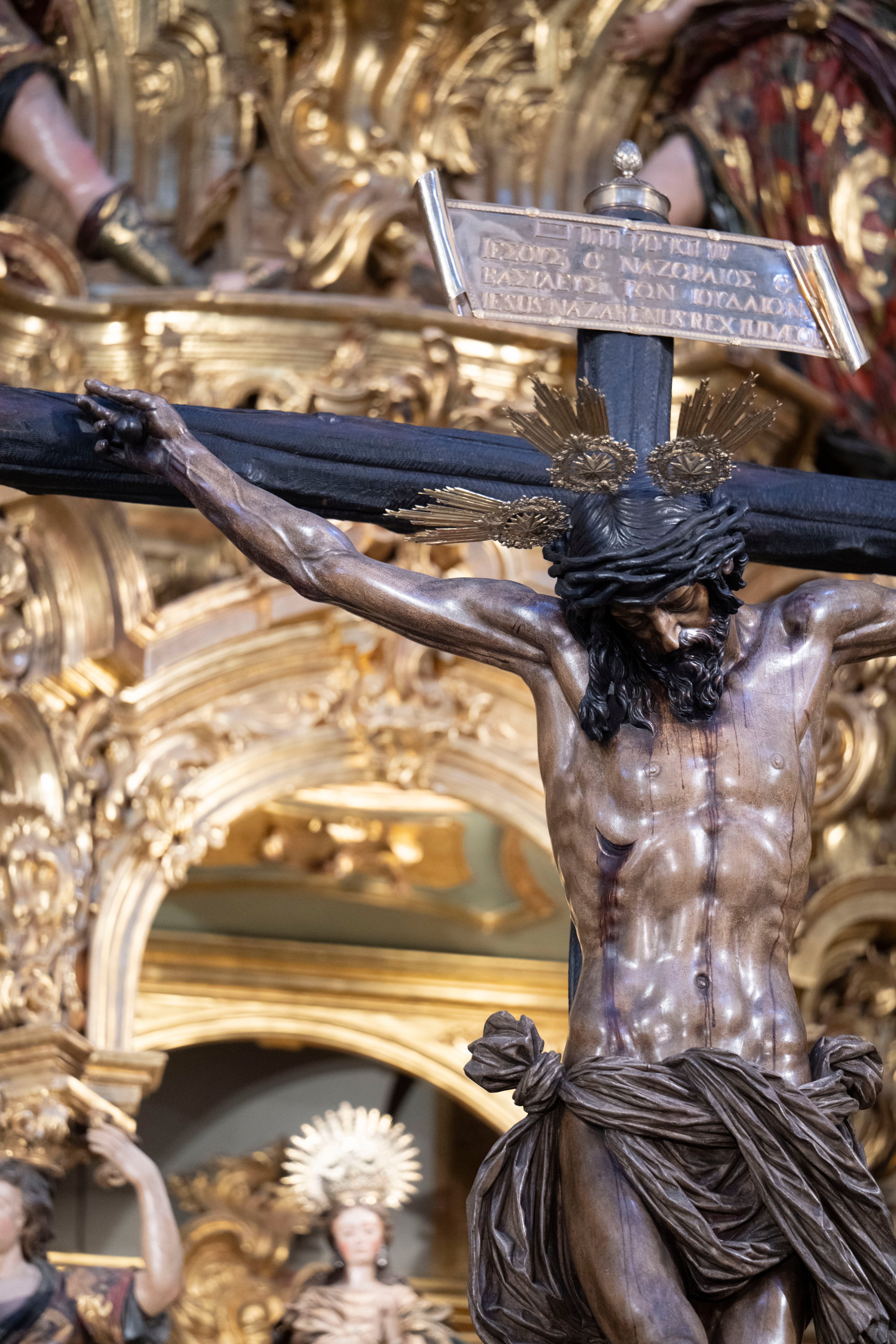 Los titulares del Amor, en el retablo mayor del Salvador
