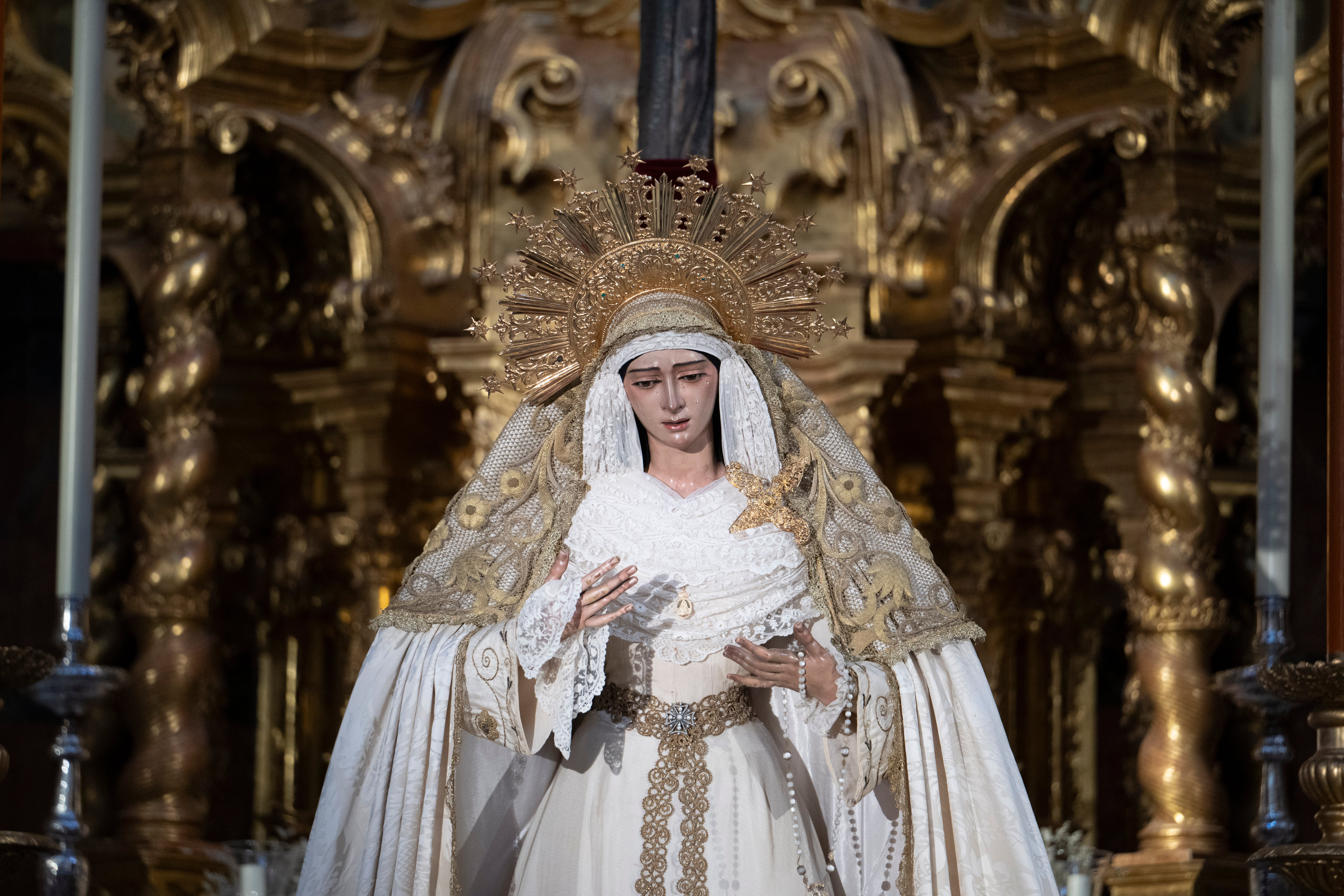 Los titulares del Amor, en el retablo mayor del Salvador