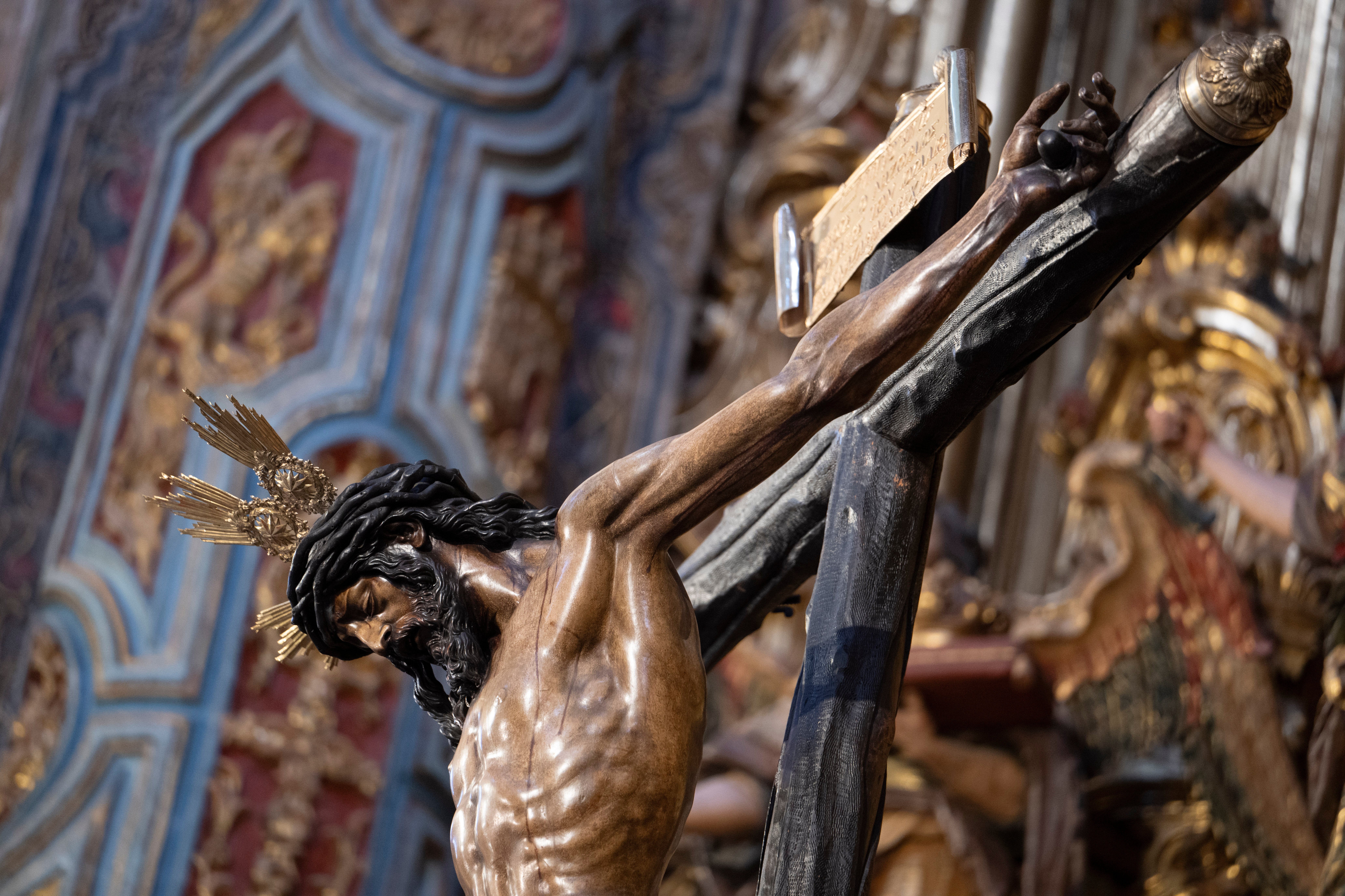Los titulares del Amor, en el retablo mayor del Salvador