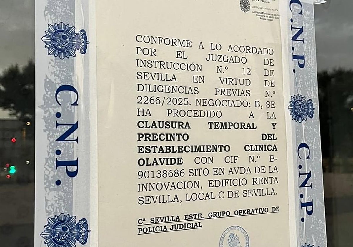 Cartel del precinto policial por orden judicial de la clínica
