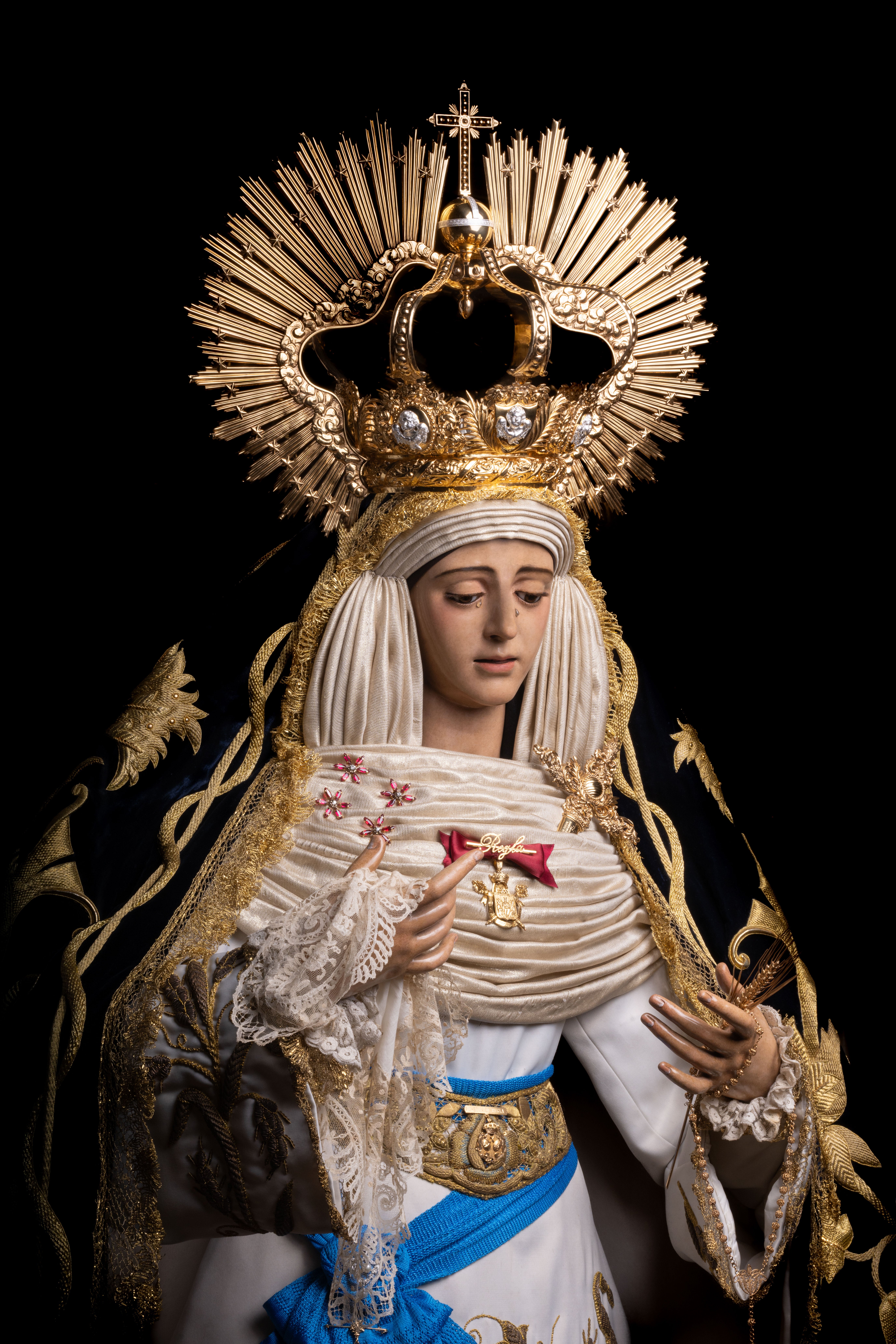 La reposición al culto de los titulares de los Panaderos, en imágenes