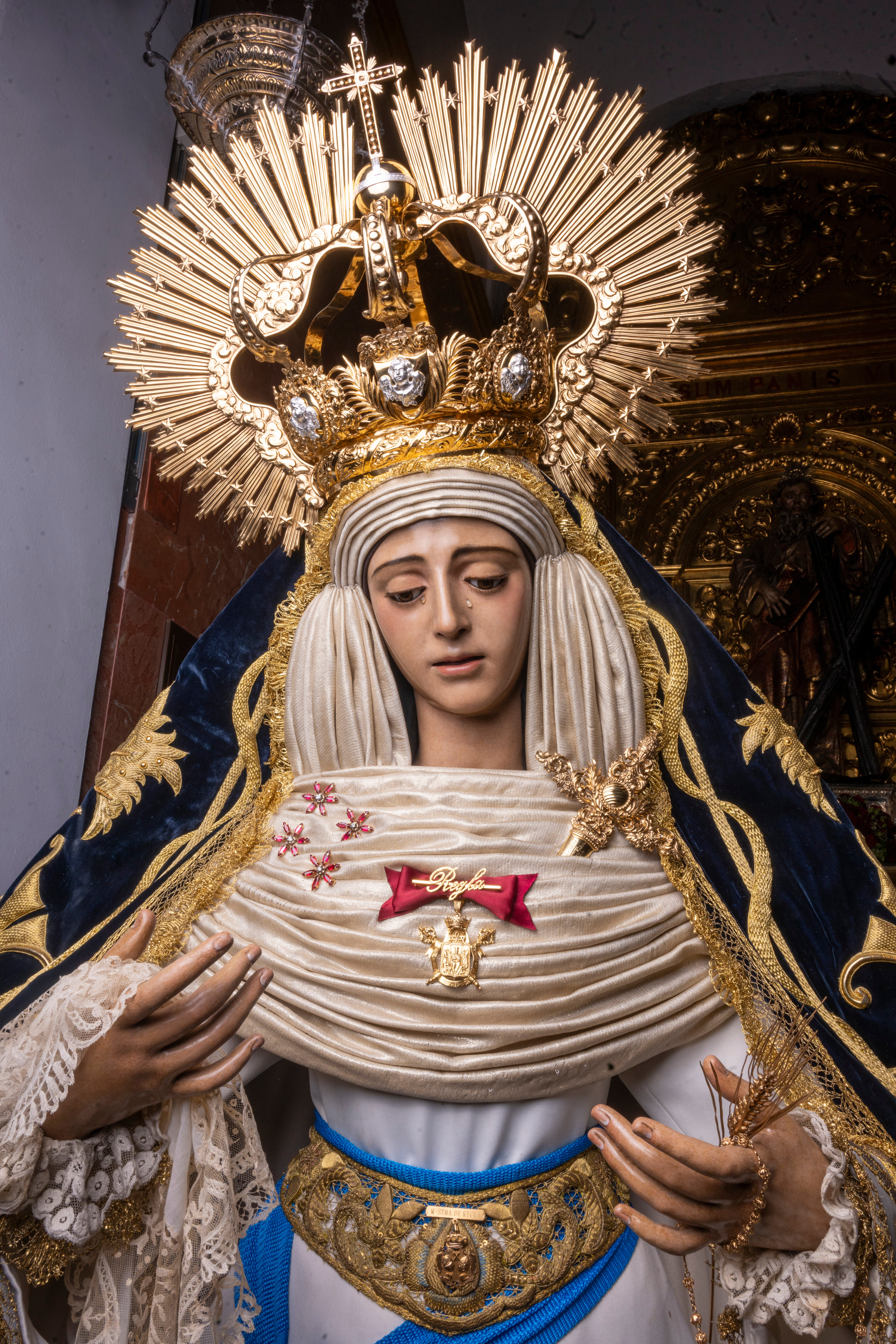 La reposición al culto de los titulares de los Panaderos, en imágenes