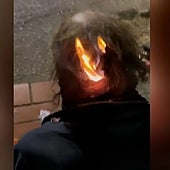 Corte del vídeo en el que dos menores queman el pelo a una persona sin hogar en Benacazón