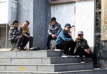 Ciudadanos en Beijing (China)