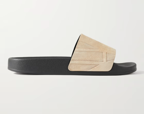 El espíritu de Río de Janeiro se refleja en estas chanclas de Frescobol Carioca confeccionadas en gamuza con un logotipo grabado y suelas de goma moldeadas que brindan un amplio agarre. Precio: 215 euros.