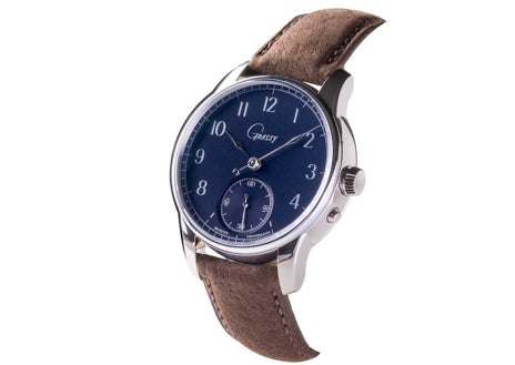 Imagen secundaria 1 - Escaparate con ilustraciones de Óscar Mariné y los relojes conmemorativos creados por Grassy en colaboración con Moritz Grossmann y Nomos