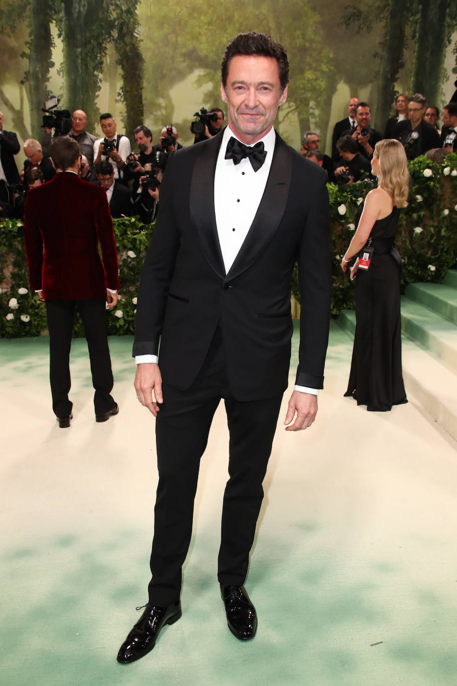 Hugh Jackman tampoco arriesgó y lució un impecable esmoquin. 