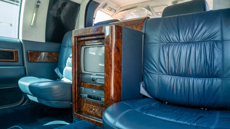 Image of the interior of the limousine with television and vhs player