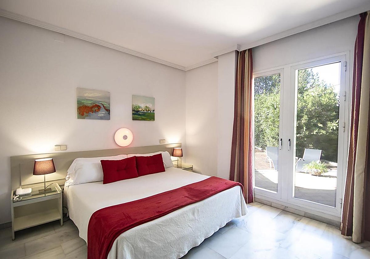 Habitación del Hospedium Hotel Apartamentos Simón Verde, uno de los hoteles con ofertas para las fechas del Congreso de Hermandades y la Magna de Sevilla