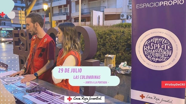 Cartel anunciador del punto violeta de Cruz Roja en las Colombinas de 2022