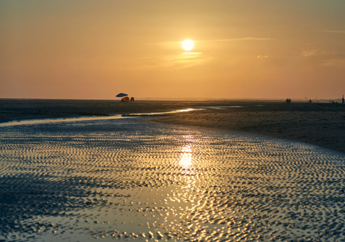 Imagen de la playa virgen de Huelva perfecta para caminar y encontrar tranquilidad, según la revista Traveler