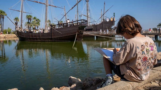 Un niño hace un dibujo del muelle