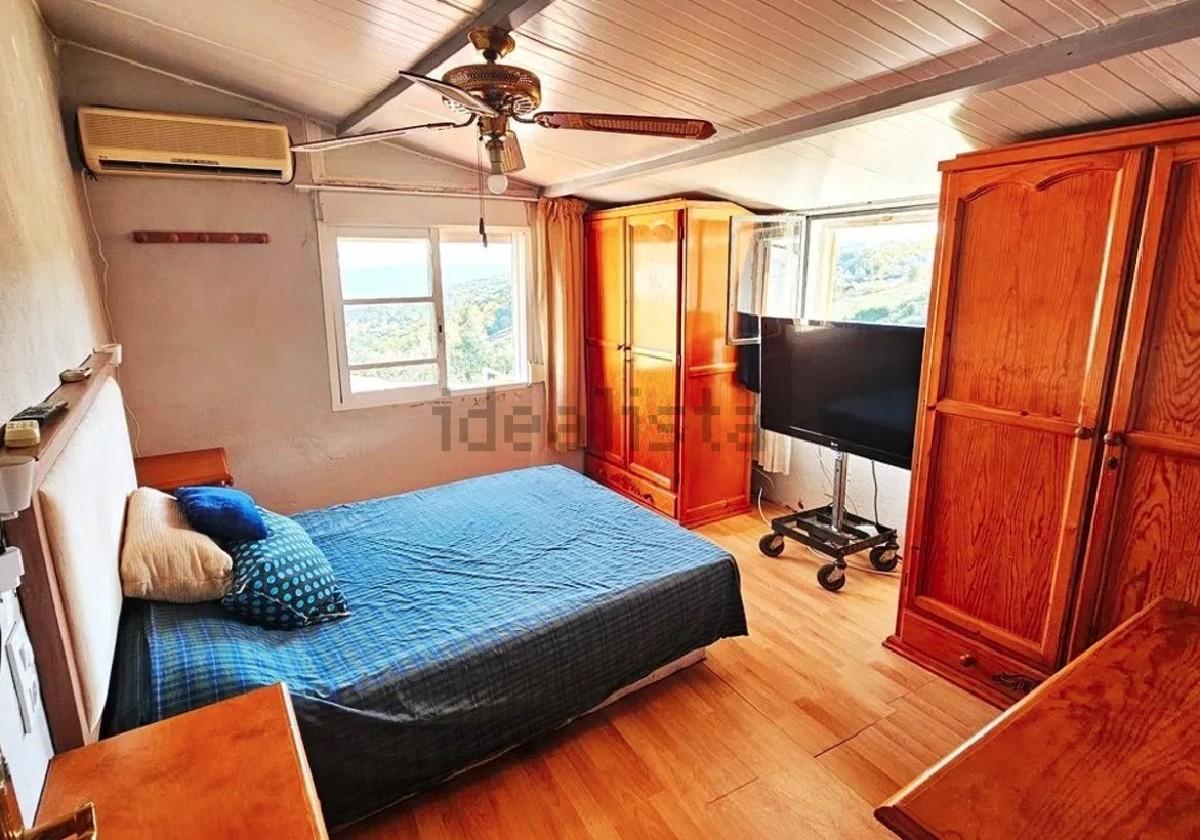 Imagen de uno de los dormitorios de la vivienda