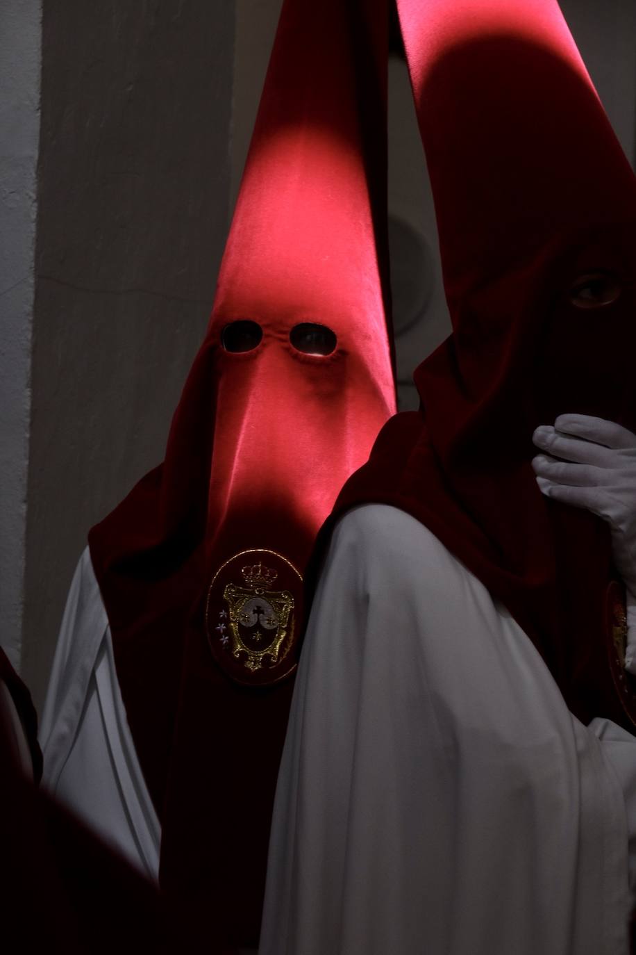 Fotos: la Borriquita ya luce en procesión en este Domingo de Ramos