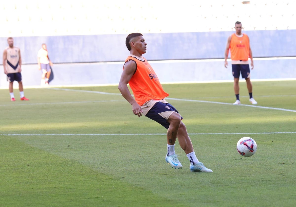 Ontiveros y Escalante, en segundo plano, en el último entrenamiento