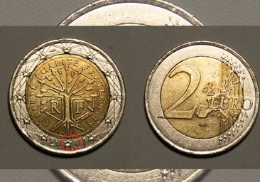 La moneda de dos euros que representa un árbol como símbolo de la vida con defectos de imprenta que puedes vender por miles de euros