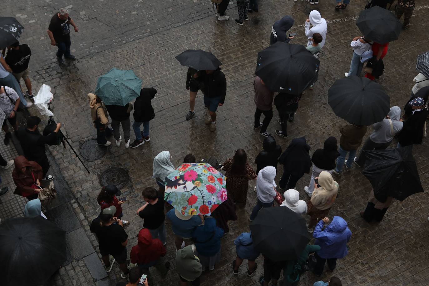 Fotos: La procesión de la Patrona de Cádiz se suspende por la lluvia