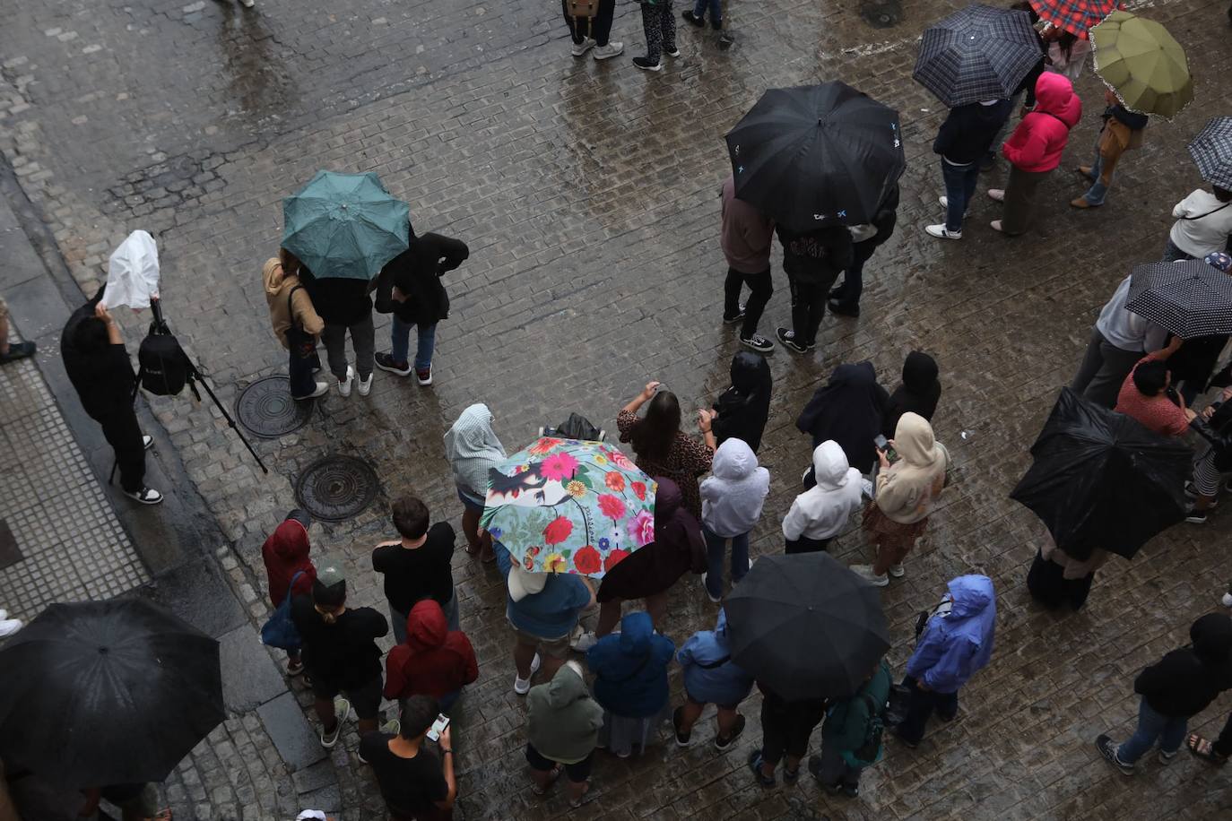 Fotos: La procesión de la Patrona de Cádiz se suspende por la lluvia