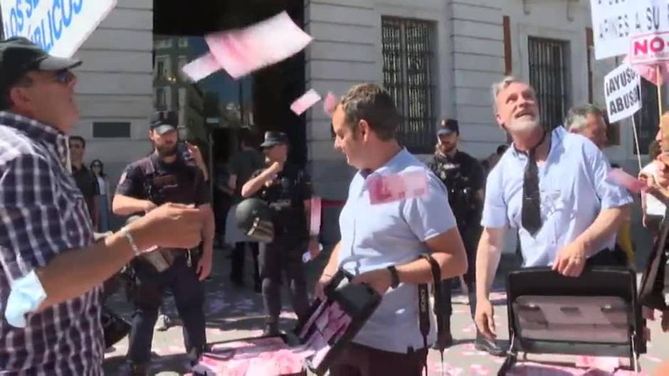 Protestas de Correos y taxistas en Madrid