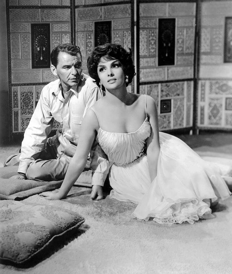 Con Gina Lollobrigida, en «Cuando hierve la sangre», de 1959