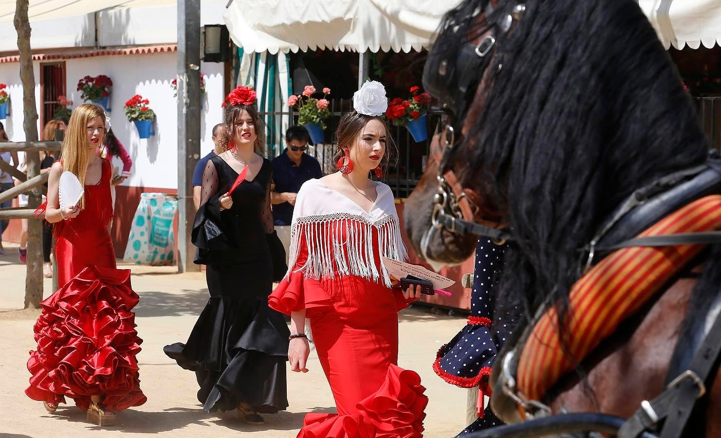 En imágenes, un jueves de Feria de sonrisas brillantes