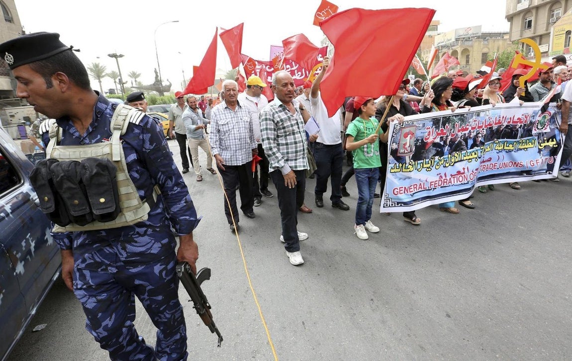 Bagdad, Iraq. Simpatizantes del partido comunista asisten a la marcha celebrada con motivo del Día Internacional de los Trabajadores en Bagdad