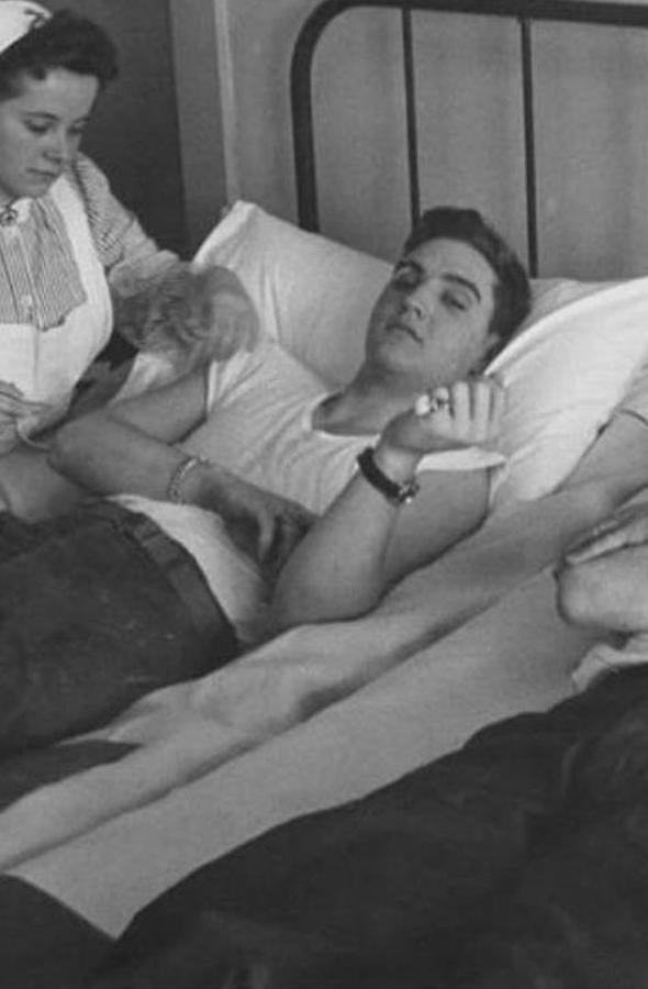 Elvis Presley, cantante. 