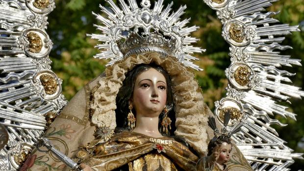 Fotogalería: La Virgen del Carmen de Calatrava recorre el Guadalquivir