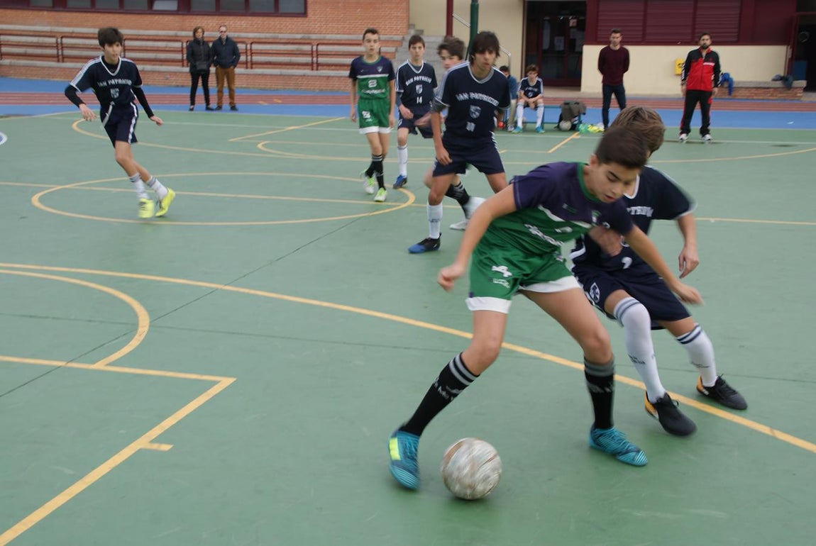 Las mejores imágenes del partido de fútbol sala cadete masculino entre San Patricio Soto Azul y Maristas Chamberí