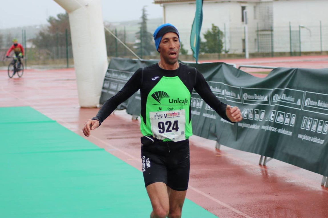 La lluviosa Media Maratón de Lucena, en imágenes