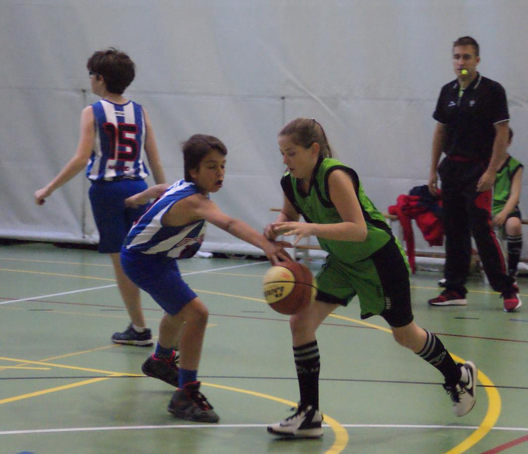Las mejores imágenes del partido de baloncesto alevín masculino entre Ntra. Sra. Recuerdo y Sagrada Familia Jorge Juan