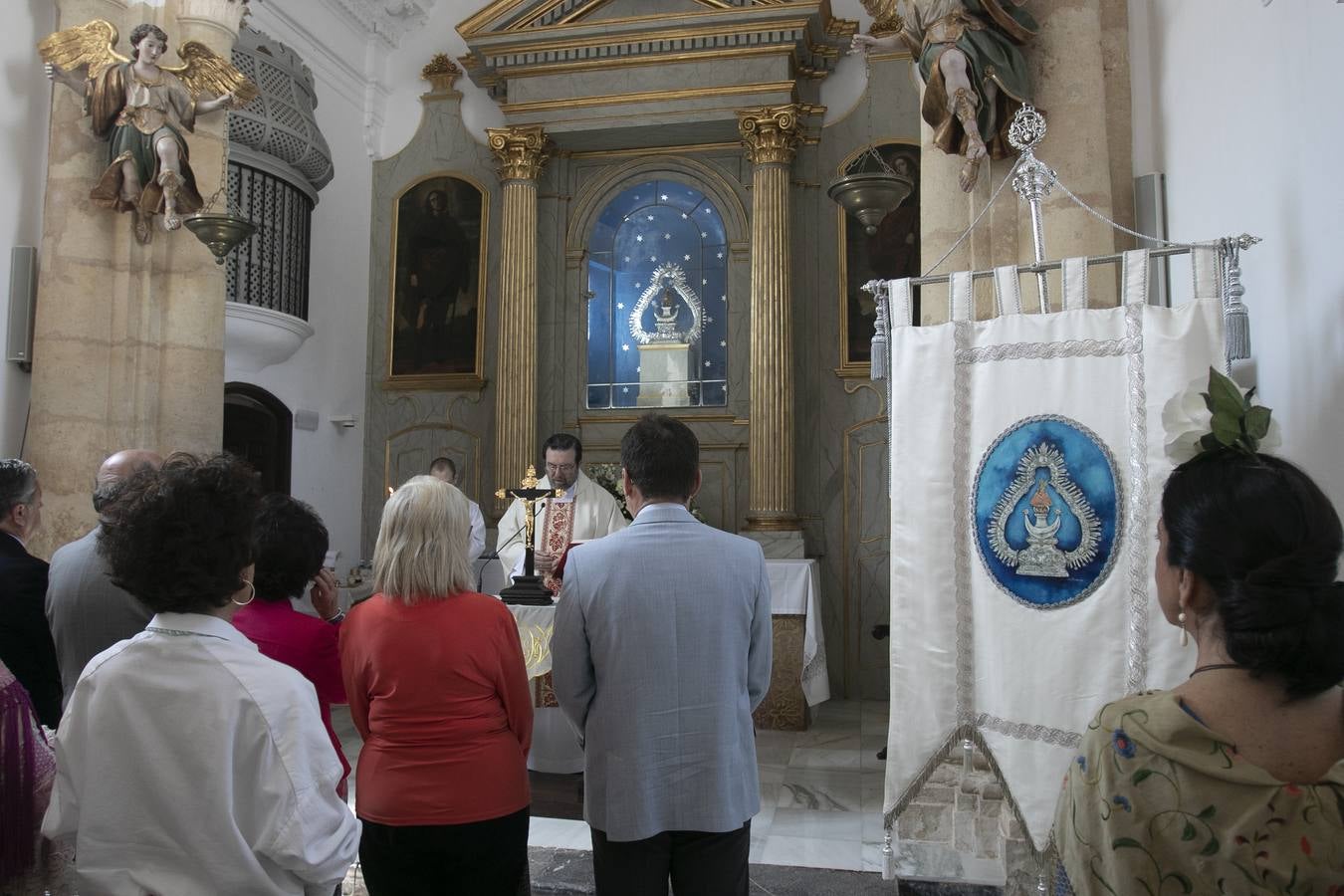 La misa y traslado del estandarte de la Virgen de la Salud de Córdoba, en imágenes