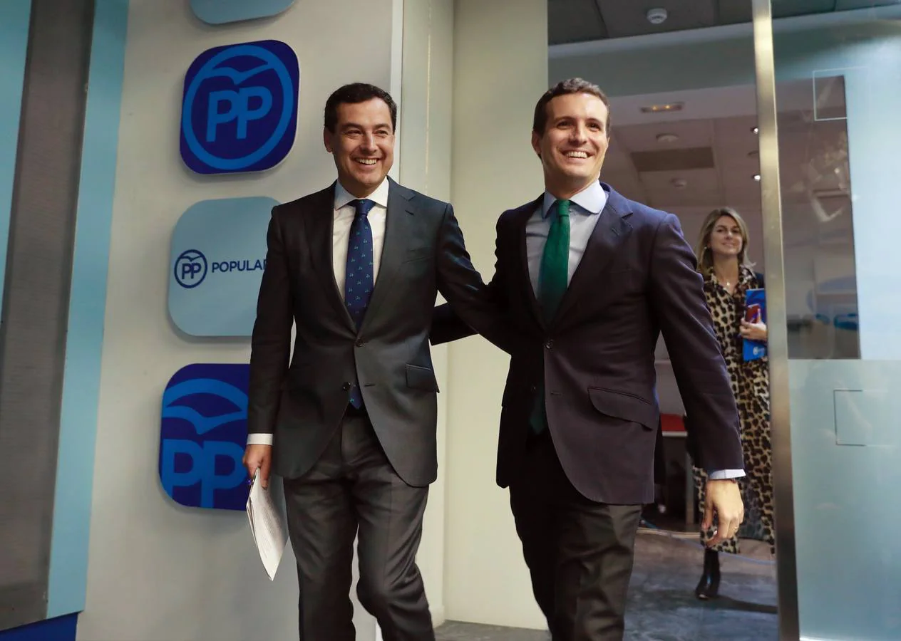 Juan Manuel Moreno y Pablo Casado, este lunes en la sede del PP en la calle Génova