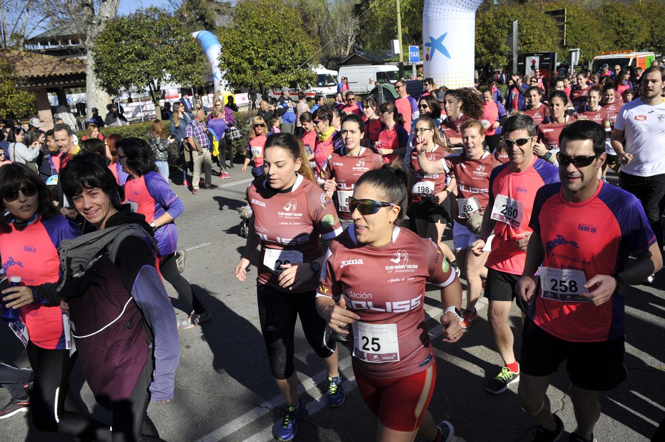 La sexta carrera solidaria «Mujeres y Hombres por la Igualdad» de Toledo, en imágenes