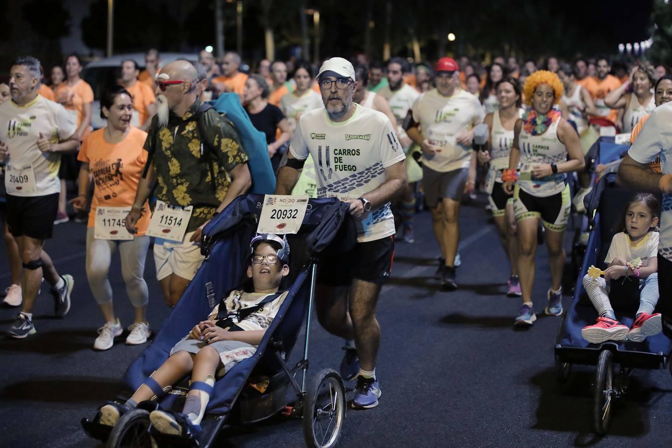 ¿Has corrido la Carrera Nocturna de Sevilla? Búscate en las fotos (III)