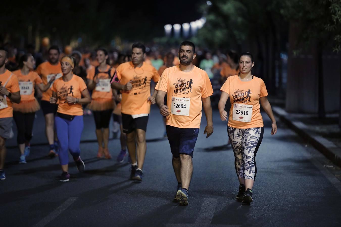 ¿Has corrido la Carrera Nocturna de Sevilla? Búscate en las fotos (III)