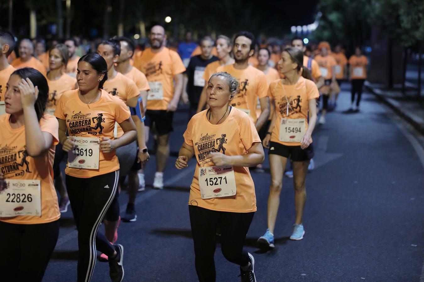 ¿Has corrido la Carrera Nocturna de Sevilla? Búscate en las fotos (III)