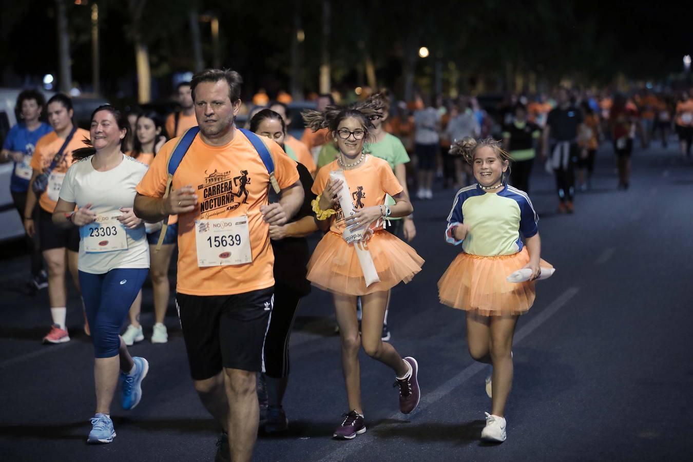 ¿Has corrido la Carrera Nocturna de Sevilla? Búscate en las fotos (III)