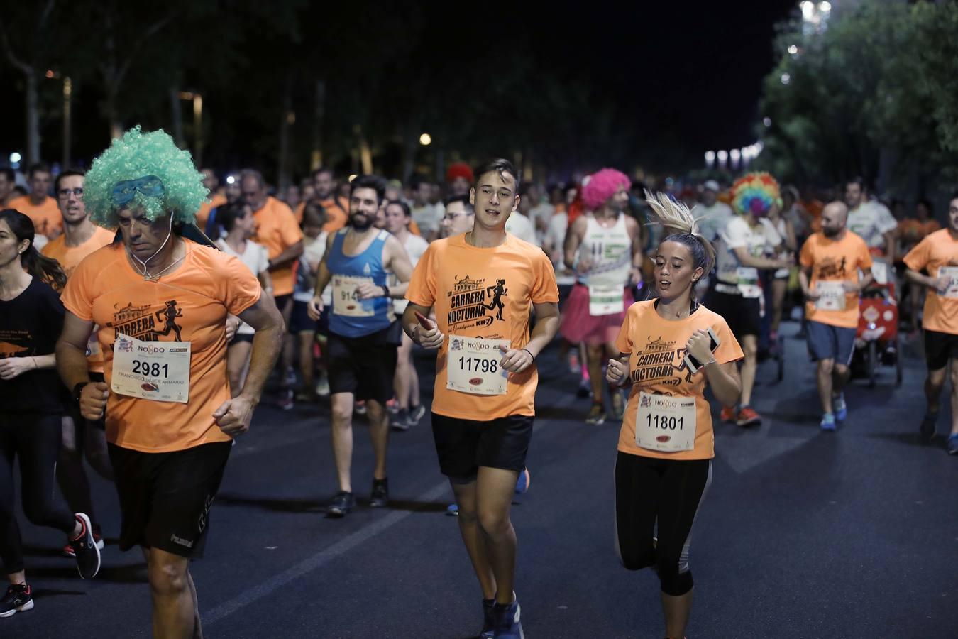 ¿Has corrido la Carrera Nocturna de Sevilla? Búscate en las fotos (III)