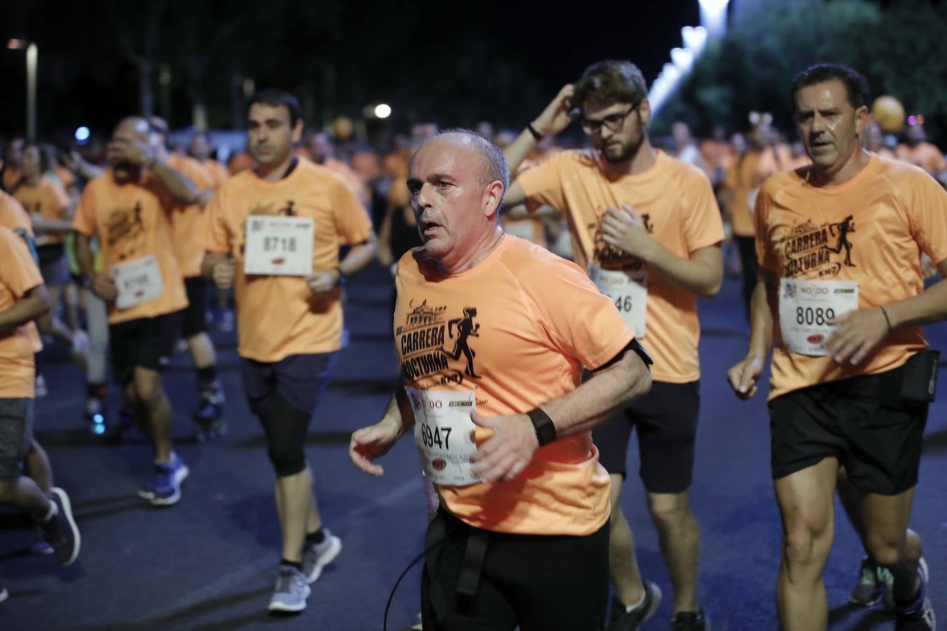 ¿Has corrido la Carrera Nocturna de Sevilla? Búscate en las fotos (V)