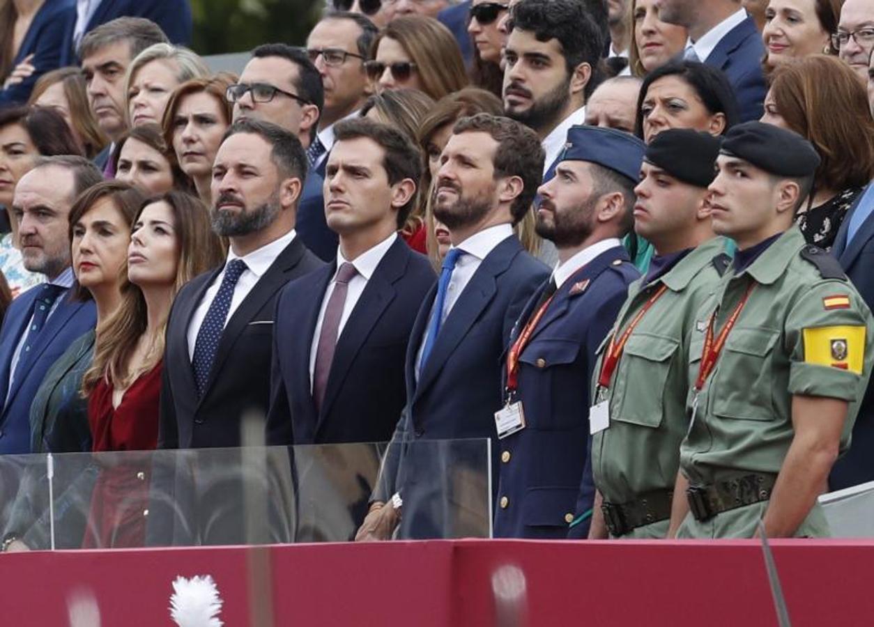 El líder de Vox Santiago Abascal, el líder de Ciudadanos Albert Rivera y el presidente del PP Pablo Casado en el desfile de la Fiesta Nacional. 