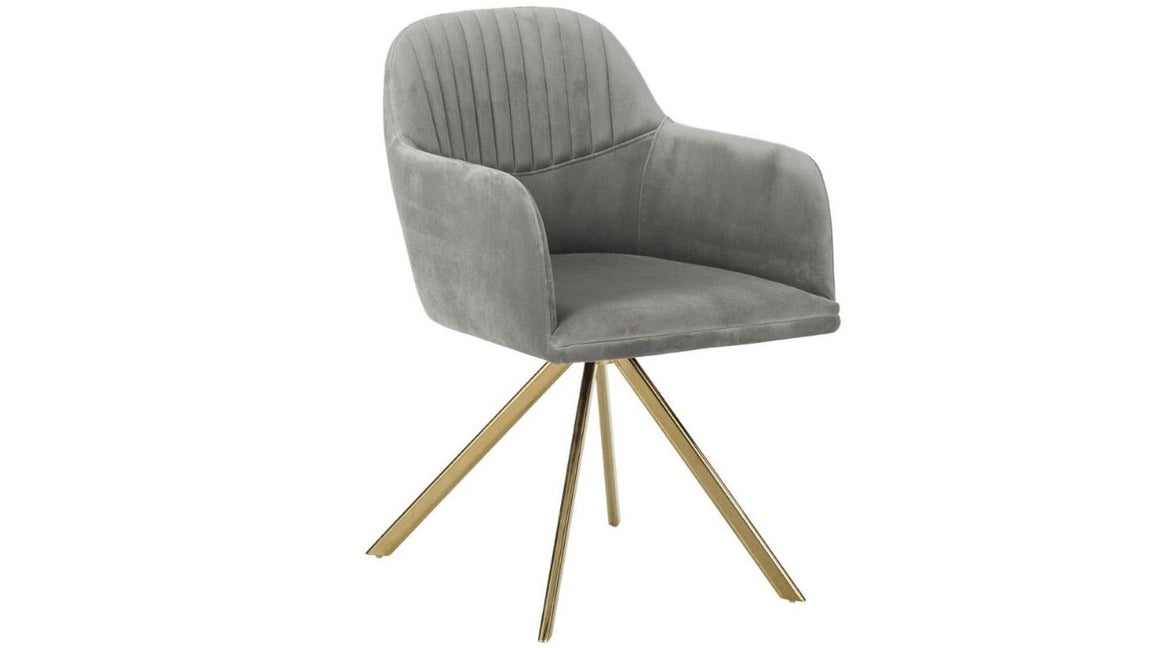 Silla giratoria de terciopelo, de Westwing. Montar tu oficina en casa no tiene que ser sinónimo de renunciar a la comodidad y el diseño, prueba de ello está en esta silla de estética retro que puede servir tanto para teletrabajar como para decorar tu salón. Precio: 249€