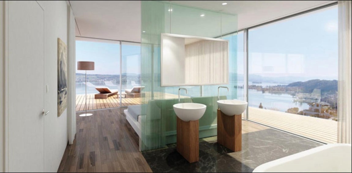 Dormitorios con vistas. Los dormitorios están orientados al lago para que puedan disfrutar de las espectaculares vistas, aunque quizás semejantes ventanales no sean muy adecuados para mantener la privacidad.