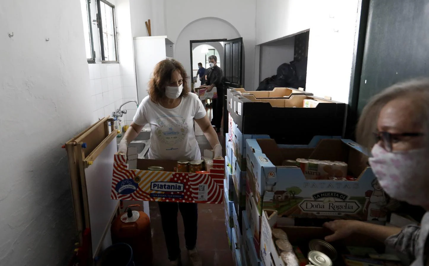 La ayuda a las familias desde las parroquias de Córdoba, en imágenes