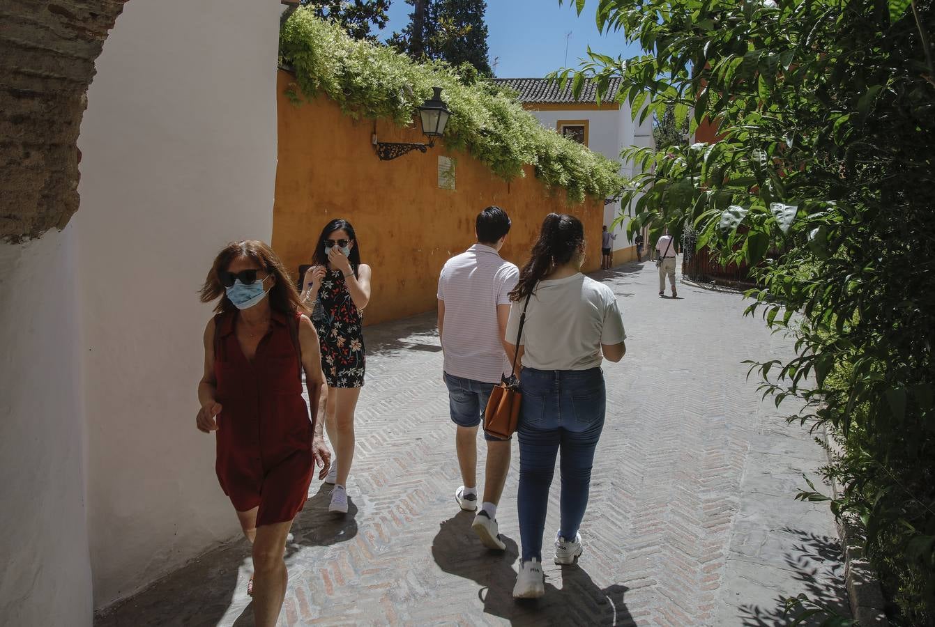 En imágenes, el calor marca la llegada de la «nueva normalidad» en Sevilla