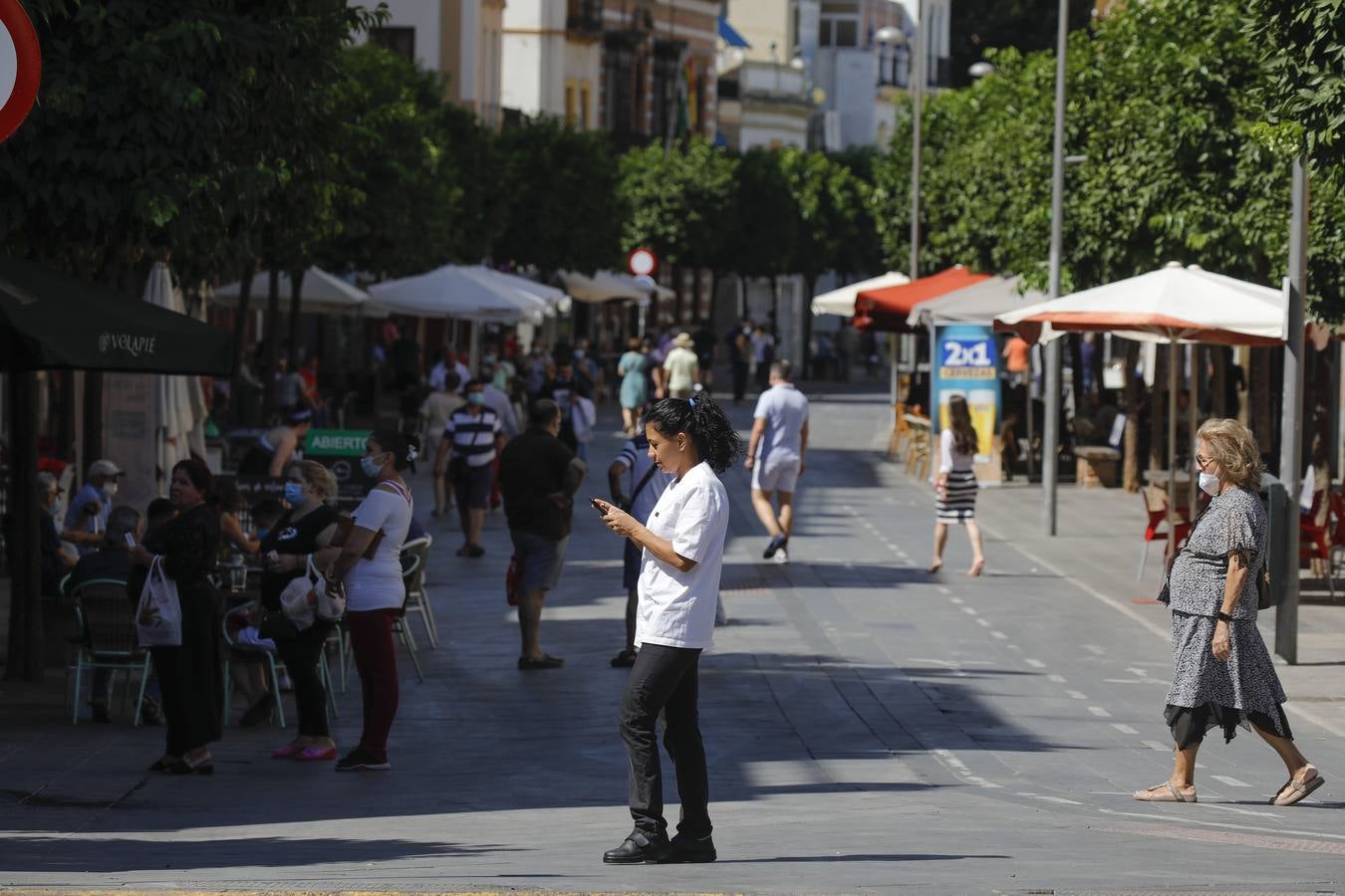 En imágenes, el calor marca la llegada de la «nueva normalidad» en Sevilla