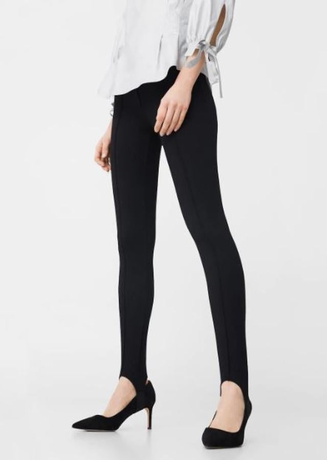 Leggings elásticos de color negro con goma bajo el pie de H&amp;M (9,99€)